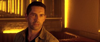 Movie still from “The Debt Collector” (2018), directed by Jesse V. Johnson – A person wearing a jacket; Close Up shot, Over the shoulder angle