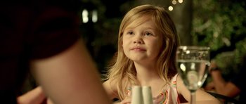 Movie still from “The Debt Collector” (2018), directed by Jesse V. Johnson – A little girl sitting in front of a mirror; Close Up shot, Over the shoulder angle