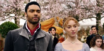 Movie still from “Bridgerton” (2020), created by Chris Van Dusen – A man and a woman standing next to each other; Close Up shot, Over the shoulder angle