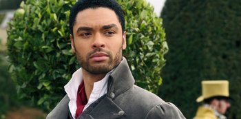 Movie still from “Bridgerton” (2020), created by Chris Van Dusen – A person wearing a jacket; Close Up shot, Over the shoulder angle