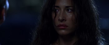 Movie still from “The Expendables” (2010), directed by Sylvester Stallone – A person with long hair; Close Up shot, Low angle