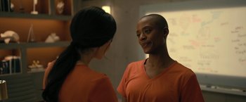 Movie still from “The Fall of the House of Usher” (2023), directed by Mike Flanagan – A woman looking at her reflection in a mirror; Close Up shot, Over the shoulder angle