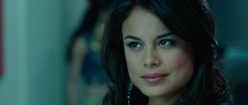 Movie still from “The Fast and the Furious: Tokyo Drift” (2006), directed by Justin Lin – A woman's face with long black hair; Close Up shot, Over the shoulder angle