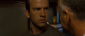 Movie still from “The Fast and the Furious: Tokyo Drift” (2006), directed by Justin Lin – A person looking at the camera; Close Up shot, Over the shoulder angle