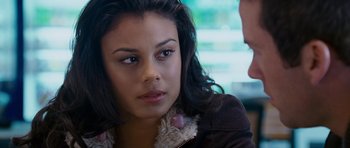 Movie still from “The Fast and the Furious: Tokyo Drift” (2006), directed by Justin Lin – A woman sitting next to another woman in a room; Close Up shot, Over the shoulder angle