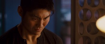 Movie still from “The Fast and the Furious: Tokyo Drift” (2006), directed by Justin Lin – A person looking at the camera; Close Up shot, Over the shoulder angle