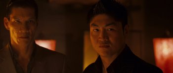 Movie still from “The Fast and the Furious: Tokyo Drift” (2006), directed by Justin Lin – A person wearing a black shirt; Close Up shot, Low angle