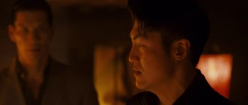 Movie still from “The Fast and the Furious: Tokyo Drift” (2006), directed by Justin Lin – A person looking at something; Close Up shot, Over the shoulder angle