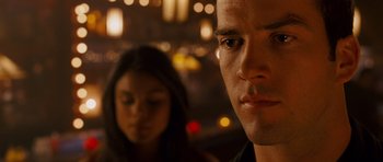 Movie still from “The Fast and the Furious: Tokyo Drift” (2006), directed by Justin Lin – A person looking at the camera; Close Up shot, Over the shoulder angle