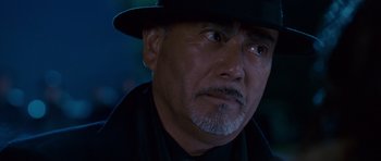 Movie still from “The Fast and the Furious: Tokyo Drift” (2006), directed by Justin Lin – A person wearing a hat; Close Up shot, Low angle