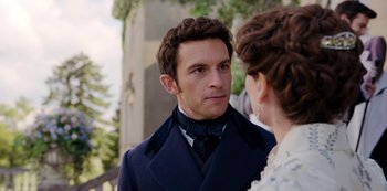Movie still from “Bridgerton” (2020), created by Chris Van Dusen – A man and a woman are looking at one another; Close Up shot, Over the shoulder angle