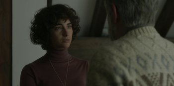 Movie still from “The Girl in the Mirror” (2022), created by Sergio G. Sánchez – A man and a woman are talking to each other; Close Up shot, Over the shoulder angle