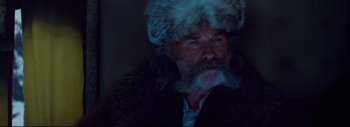 Movie still from “The Hateful Eight” (2015), directed by Quentin Tarantino – A man with a beard and a fur hat; Close Up shot, Low angle