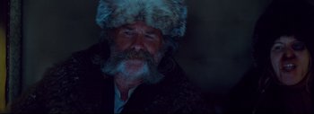 Movie still from “The Hateful Eight” (2015), directed by Quentin Tarantino – An old man with a beard and a fur hat; Close Up shot, Low angle