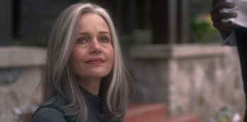 Movie still from “The Haunting of Bly Manor” (2020), directed by E.L. Katz – A person with grey hair; Close Up shot, Over the shoulder angle