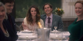 Movie still from “The Haunting of Bly Manor” (2020), directed by E.L. Katz – A man and a woman sitting at a dinner table; Medium shot, Over the shoulder angle