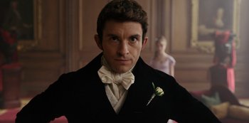 Movie still from “Bridgerton” (2020), created by Chris Van Dusen – A man wearing a black jacket and a white bow tie; Close Up shot, Over the shoulder angle