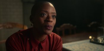 Movie still from “The Haunting of Bly Manor” (2020), directed by E.L. Katz – A person wearing a red shirt; Close Up shot, Over the shoulder angle