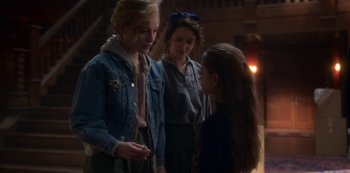 Movie still from “The Haunting of Bly Manor” (2020), directed by E.L. Katz – A group of young women standing next to each other; Medium shot, Over the shoulder angle