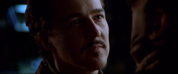 Movie still from “The Italian Job” (2003), directed by F. Gary Gray – A man with a mustache; Close Up shot, Low angle