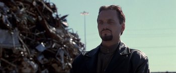 Movie still from “The Italian Job” (2003), directed by F. Gary Gray – A person wearing a jacket; Close Up shot, Low angle