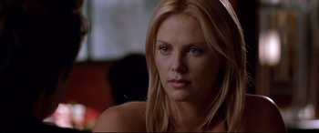 Movie still from “The Italian Job” (2003), directed by F. Gary Gray – Charlize theron in a scene from the movie the devil's advocate; Close Up shot, Low angle