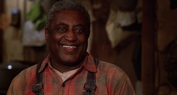 Movie still from “The Jerk” (1979), directed by Carl Reiner – An older black man smiling for the camera; Close Up shot, Low angle
