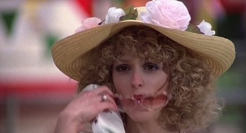 Movie still from “The Jerk” (1979), directed by Carl Reiner – A person wearing a straw hat; Close Up shot, Low angle