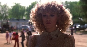 Movie still from “The Jerk” (1979), directed by Carl Reiner – A person with curly hair; Close Up shot, Low angle