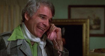 Movie still from “The Jerk” (1979), directed by Carl Reiner – An older man talking on a pink phone; Close Up shot, Low angle