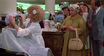 Movie still from “The Jerk” (1979), directed by Carl Reiner – Two women dressed up as old ladies in a store; Medium shot, Over the shoulder angle