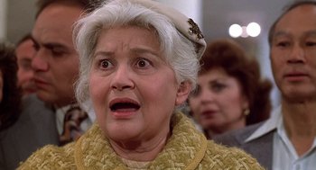 Movie still from “The Jerk” (1979), directed by Carl Reiner – An older woman with a surprised look on her face; Close Up shot, Low angle