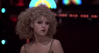 Movie still from “The Jerk” (1979), directed by Carl Reiner – A woman with a blonde curly hair wearing a tiara; Close Up shot, Low angle