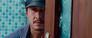 Movie still from “The Karate Kid” (2010), directed by Harald Zwart – A person wearing a hat; Close Up shot, Over the shoulder angle