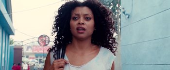 Movie still from “The Karate Kid” (2010), directed by Harald Zwart – A person with curly black hair; Close Up shot, Over the shoulder angle