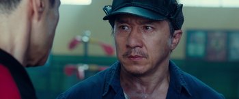 Movie still from “The Karate Kid” (2010), directed by Harald Zwart – A person wearing a hat; Close Up shot, High angle