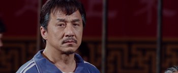 Movie still from “The Karate Kid” (2010), directed by Harald Zwart – A person wearing a blue shirt; Close Up shot, Low angle