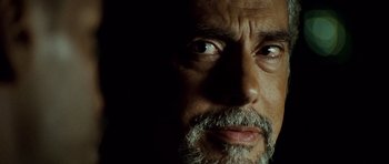 Movie still from “The Kingdom” (2007), directed by Peter Berg – A person with a beard; Extreme Close Up shot, Low angle