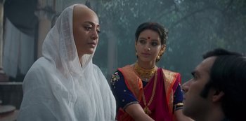 Two women dressed in traditional indian garb