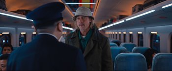 Movie still from “Bullet Train” (2022), directed by David Leitch – Medium shot, Over the shoulder angle
