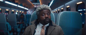 Movie still from “Bullet Train” (2022), directed by David Leitch – Medium shot, High angle