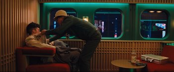 Movie still from “Bullet Train” (2022), directed by David Leitch – Wide shot, Over the shoulder angle