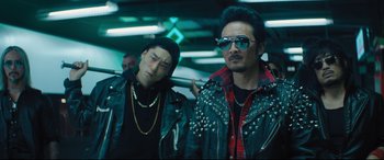 Movie still from “Bullet Train” (2022), directed by David Leitch – A couple of people that are in a room; Medium shot, Low angle