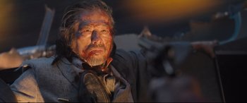 Movie still from “Bullet Train” (2022), directed by David Leitch – A person with blood all over his face; Close Up shot, Low angle
