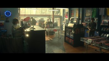 Movie still from “The Midnight Club” (2022), created by Mike Flanagan – A room filled with lots and lots of books; Extreme Wide shot, High angle