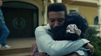 Movie still from “The Midnight Club” (2022), created by Mike Flanagan – A man and a woman hugging each other outside; Close Up shot, Over the shoulder angle