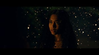 Movie still from “The Midnight Club” (2022), created by Mike Flanagan – A beautiful young woman standing in front of lights; Close Up shot, Over the shoulder angle