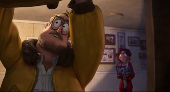 Movie still from “The Mitchells vs the Machines” (2021), directed by Jeff Rowe – An animated man holding a banana in front of a woman; Medium shot, Over the shoulder angle