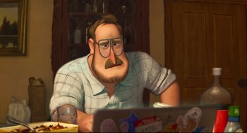 Movie still from “The Mitchells vs the Machines” (2021), directed by Jeff Rowe – An animated man sitting at a table looking at a laptop computer; Medium shot, Over the shoulder angle
