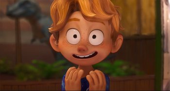 Movie still from “The Mitchells vs the Machines” (2021), directed by Jeff Rowe – A cartoon of a boy with his hands clasped together; Close Up shot, Over the shoulder angle